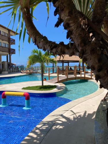The swimming pool at or close to Apartamento Barra Bali Resort