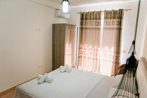 Postel nebo postele na pokoji v ubytování Apartments Casa Mia