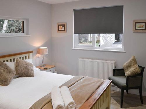 Ένα ή περισσότερα κρεβάτια σε δωμάτιο στο Serenity Lodge Otterburn