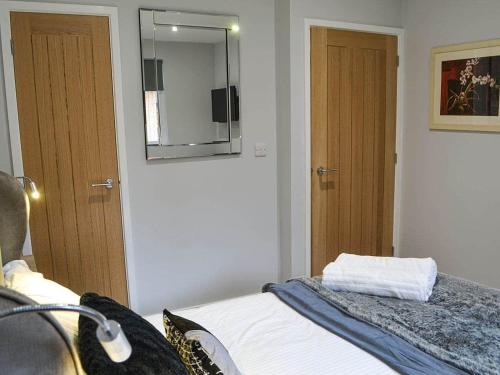 Ένα ή περισσότερα κρεβάτια σε δωμάτιο στο Serenity Lodge Otterburn