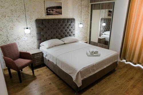 Postel nebo postele na pokoji v ubytování Apartments Casa Mia