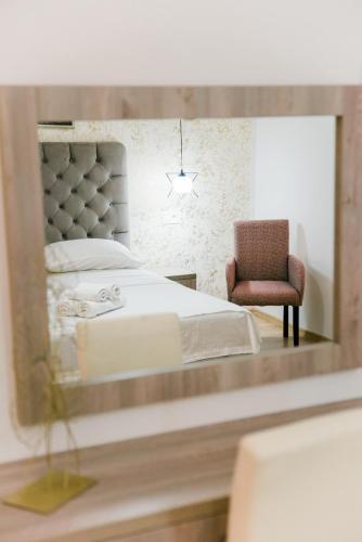 Postel nebo postele na pokoji v ubytování Apartments Casa Mia