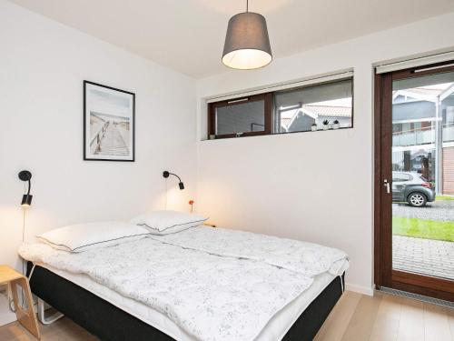 Postel nebo postele na pokoji v ubytování Apartment Bogense LXI