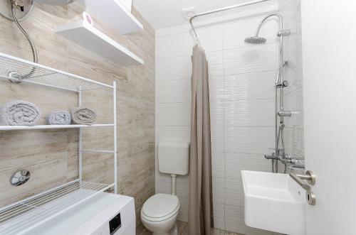 Kúpeľňa v ubytovaní Apartment Paradise