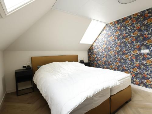 Ліжко або ліжка в номері Nice villa in Wieringer style near the Wadden Sea