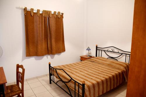 Driopida 5 Irida tesisinde bir odada yatak veya yataklar