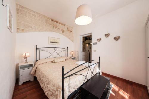 Säng eller sängar i ett rum på Casa Chiasso Cacace