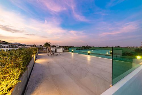 a view from the roof of a house with a patio at Modern 4 Bedroom Pool Villa KH-A5 in Khao Tao