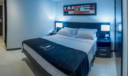 Postel nebo postele na pokoji v ubytování Hotel Metropolitano