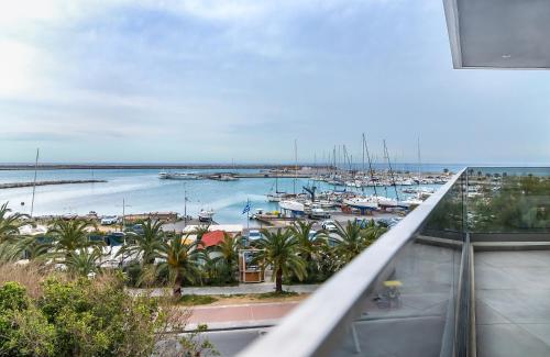 a view of a harbor with boats in the water at SAVUS Boutique Hotel in Rethymno Town