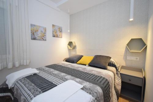 Postel nebo postele na pokoji v ubytování LUX CENTER - Fincas Arena
