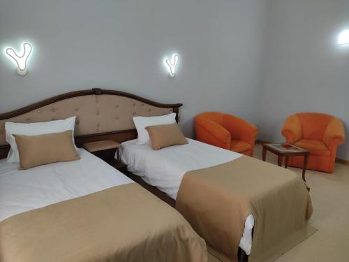 Postel nebo postele na pokoji v ubytování Shindan Hotel Astara