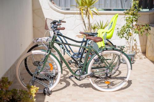 two bikes are parked next to each other at Fuori Rotta in Avola