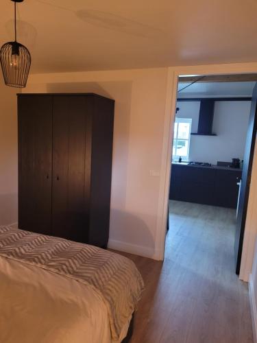 Katil atau katil-katil dalam bilik di B&B de Bommelhoeve