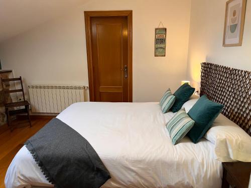 Postel nebo postele na pokoji v ubytování Galicia Getaway - A Casa dos Cancelos