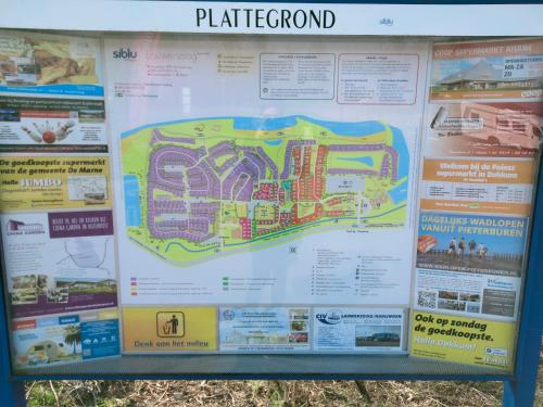 a sign with a map of a park at BJ Chalets - Robbengat 68 - Gezellige chalet op vakantiepark Lauwersoog! Vroege incheck! in Lauwersoog