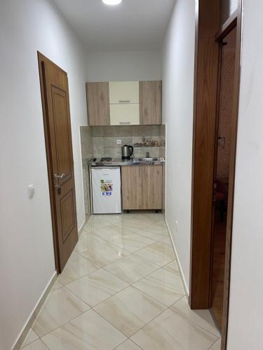 Kuchyň nebo kuchyňský kout v ubytování Apartments Casa Mia