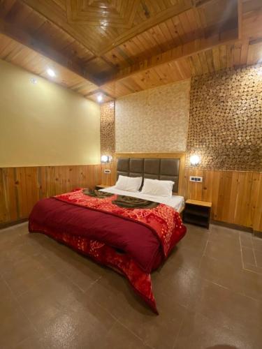 Ένα ή περισσότερα κρεβάτια σε δωμάτιο στο Dhi Ananta Homestay - Pure Veg