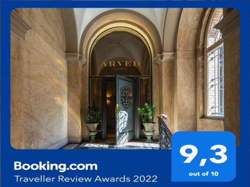 a hotel entrance with a door in a building at ARVED Apartments in Lübeck