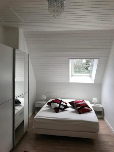 En eller flere senge i et værelse på Maison moderne 8 personnes, jardin, parkings, fibre THD, plage 5 min