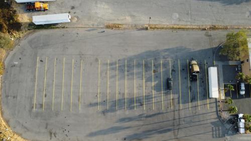 an overhead view of a parking lot with a fence at Econo Lodge Inn & Suites Corning Travel Center in Corning