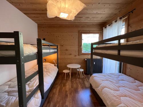 Ένα ή περισσότερα κρεβάτια σε δωμάτιο στο Elan 12 - Très bel appartement centre village