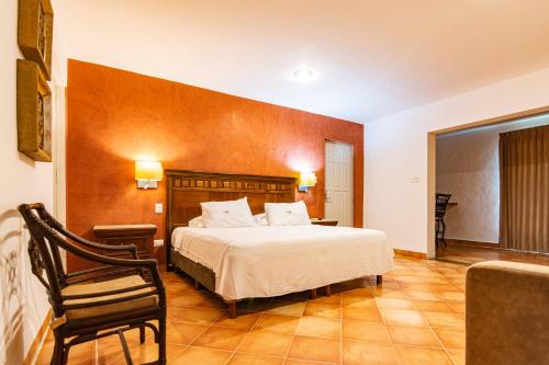 Una cama o camas en una habitación de Hotel María Jose