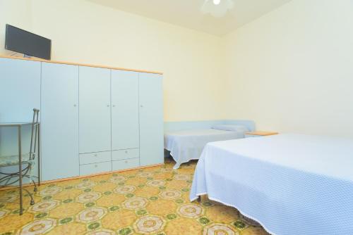 Cama o camas de una habitación en Hotel Celeste