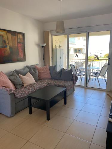 a living room with a couch and a table at Great Kings Resort, Kapparis, Cyprus - Self Catering Apartment, Sleeps 6 in Paralimni