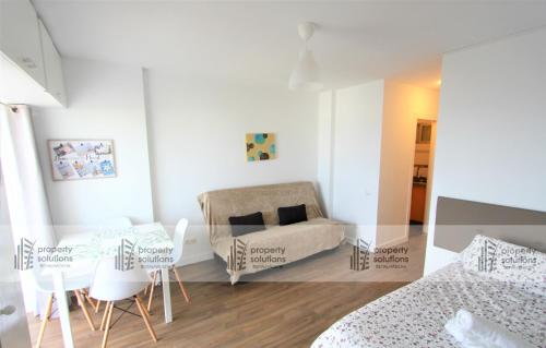 Postel nebo postele na pokoji v ubytování 712 Iris Apartamentos - Vista al mar - A 10 min de la playa caminando y 5 min del centro