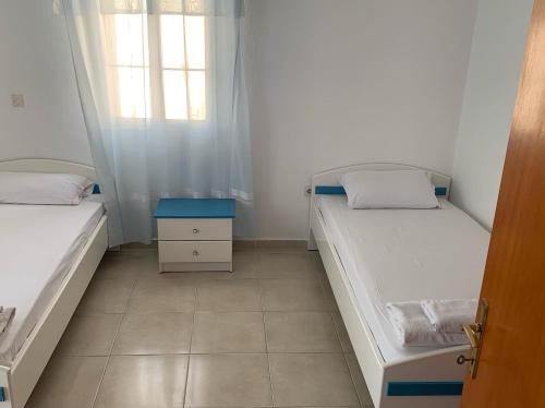 Ένα ή περισσότερα κρεβάτια σε δωμάτιο στο Mare - Rooms