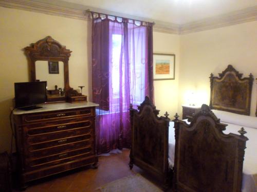 En eller flere senger på et rom på Antica Dimora Fuori Le Mura B&B