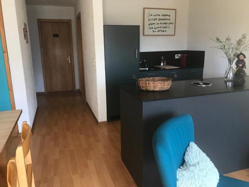 TV a/nebo společenská místnost v ubytování Lärchenwald Lodge