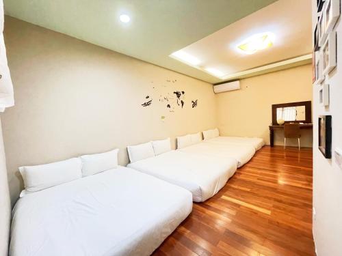 Cama o camas de una habitación en 羽竹民宿 -- 自助方式-附免費停車--