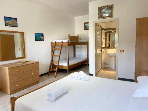 เตียงในห้องที่ Residenza La Grazia Tropea - Free Parking -