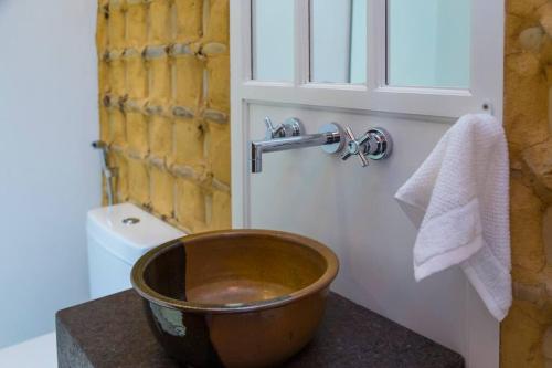 Ein Badezimmer in der Unterkunft Canto do Ilé Dive & Lodge