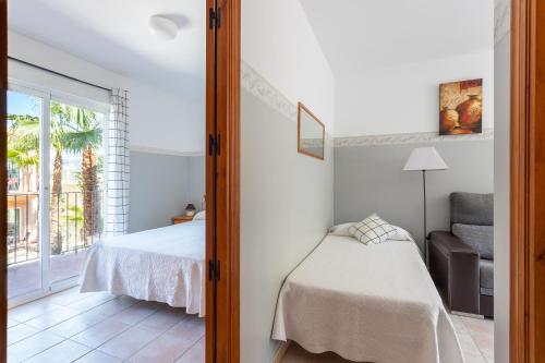 Katil atau katil-katil dalam bilik di Apartamentos Mundaka Albir