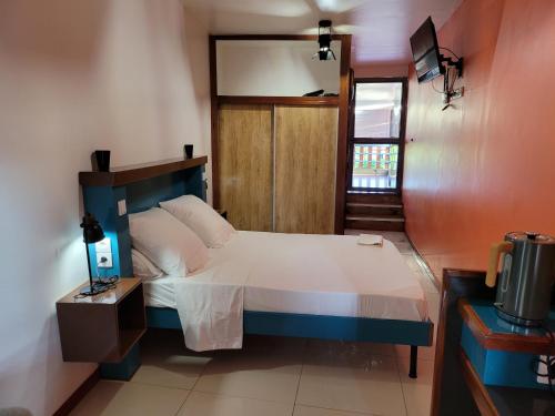 Una cama o camas en una habitación de Yangou Appart 2