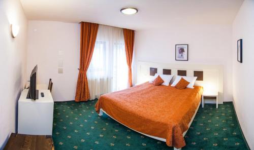 Ένα ή περισσότερα κρεβάτια σε δωμάτιο στο Hotel Draga Maria