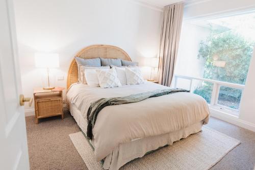 Un pat sau paturi într-o cameră la The Retreat at Stirling