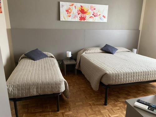 Кровать или кровати в номере La Bossolasca Albergo Ristorante