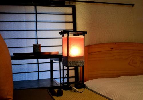 Kyoto Shirakawa Kiraku Innにあるベッド