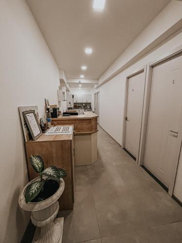 a kitchen with a toilet in the middle of a room at Best Builder in Tbilisi City