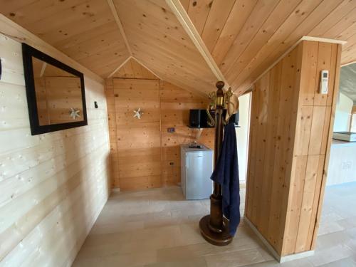 a room in a cabin with wood paneling at Villa Civita in Colonnella