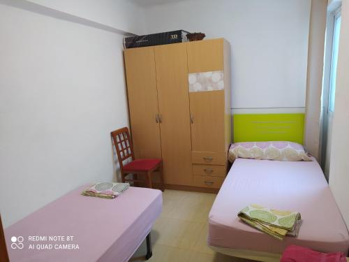 Cama o camas de una habitación en Burjassot Mestalla