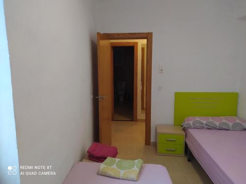 Cama o camas de una habitación en Burjassot Mestalla