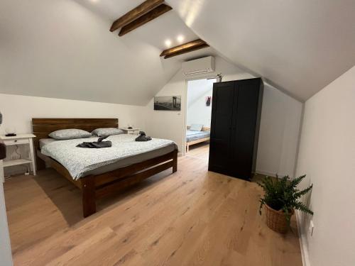 Tempat tidur dalam kamar di Apartmán Provence Deluxe