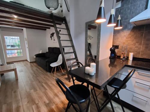Posedenie v ubytovaní Budha Luxury Apartment Centro Histórico de Málaga