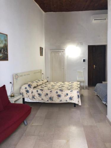 Ένα ή περισσότερα κρεβάτια σε δωμάτιο στο Rocca Sul Mare Hotel