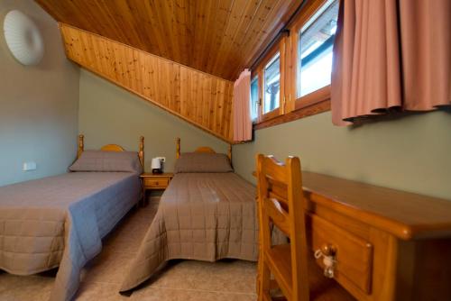 En eller flere senger på et rom på Casa Apartamento de montaña